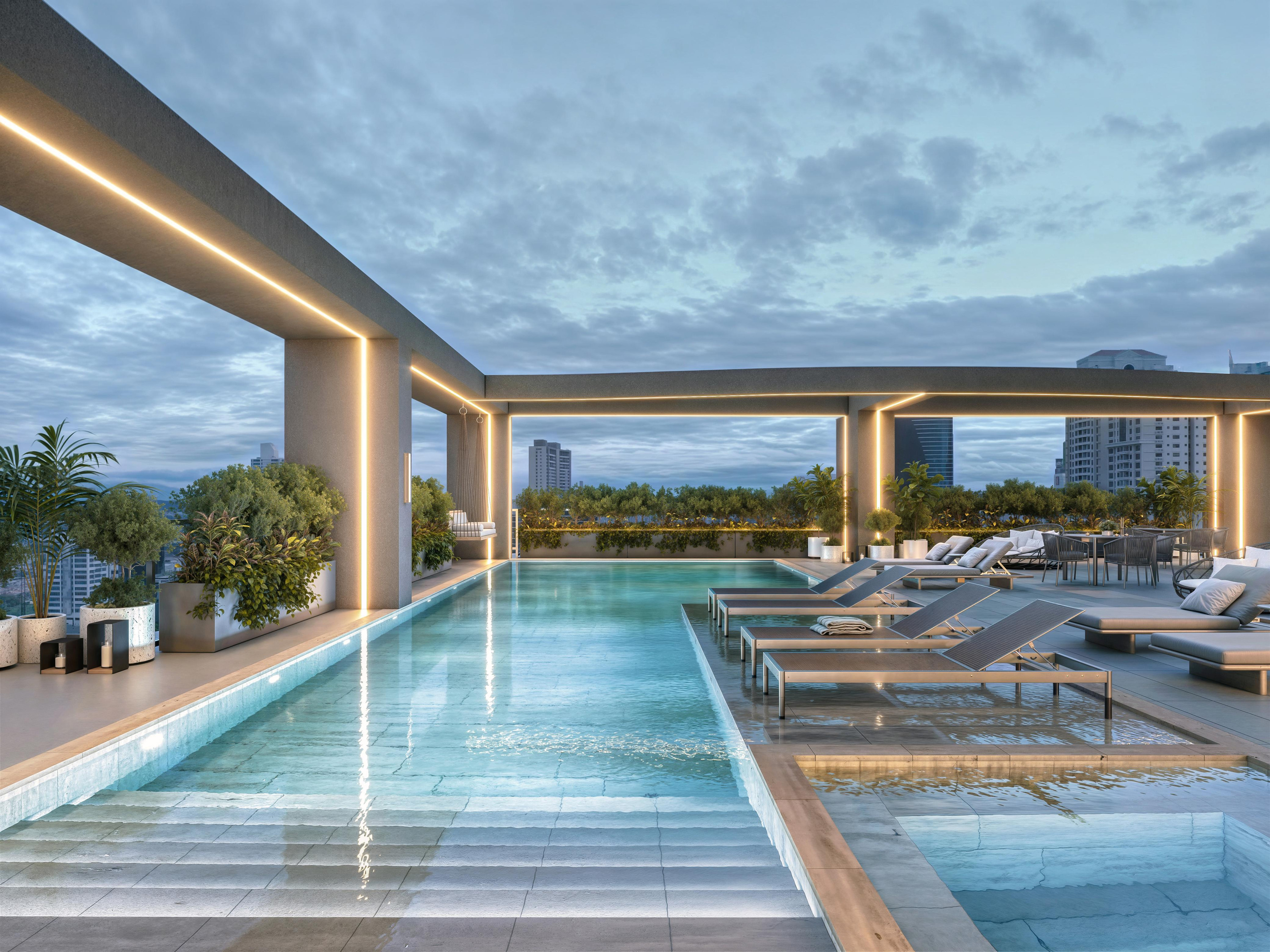 Piscina na cobertura com espreguiçadeiras e vista para as torres de Costa del Este.